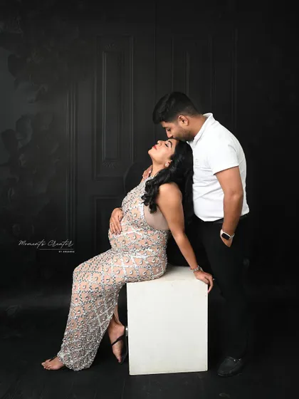 A tender forehead kiss is a simple yet powerful expression of love. I focus on capturing these small gestures that tell a big story about the couple's bond.