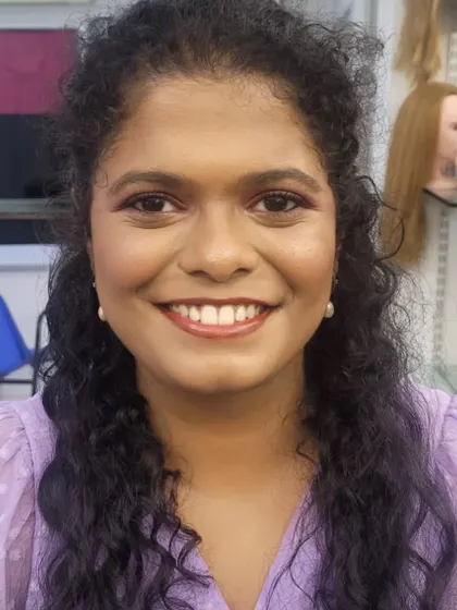 Another shot of the corrective makeup look. The makeup is blended seamlessly to look like second skin, enhancing her beautiful smile.