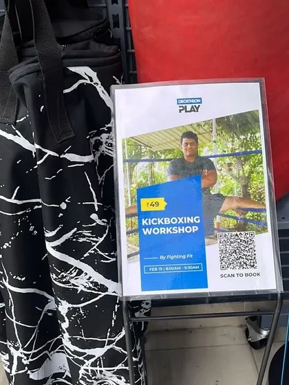 Our kickboxing workshop poster on display at Decathlon RCity mall. We partner with brands to bring training to the community.