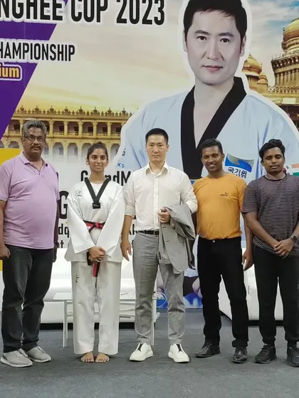 Our coaching team with a Grandmaster. We build relationships with international figures to bring world-class knowledge to our academy.