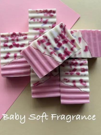 This design has a soft, powdery Baby Soft fragrance. The pink confetti-like pieces are scattered through the top layer, making each bar unique.