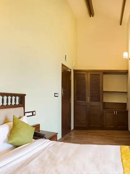 Your room is a sanctuary of calm. We've designed our accommodations to be simple, clean, and comfortable, with natural wood finishes and soft lighting to create a restful environment that supports your healing process.