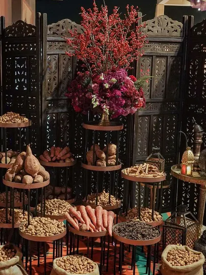 A spice station from the 'Moroccan Bazaar' event, where guests could see and smell a variety of whole spices. This multi-sensory detail added another layer of authenticity to the immersive theme.