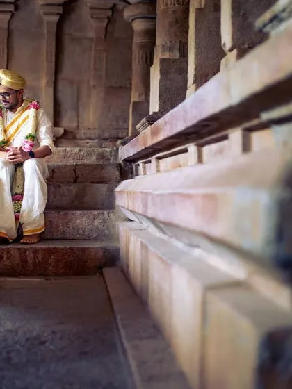 A duplicate of image 486, a beautifully lit, intimate portrait inside a temple.