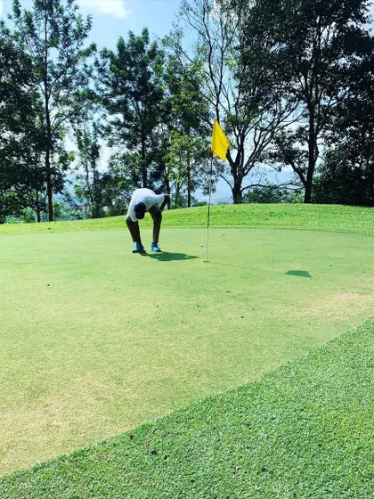 Even champions take care of the course. Here's Rohan Bopanna on the green, showing the great etiquette that all golfers should practice.