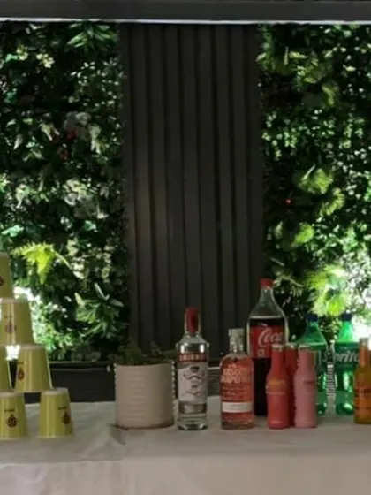 The fun and games corner at a rooftop party. A well-stocked bar and a setup for beer pong ensure that the guests have a great time all night long.
