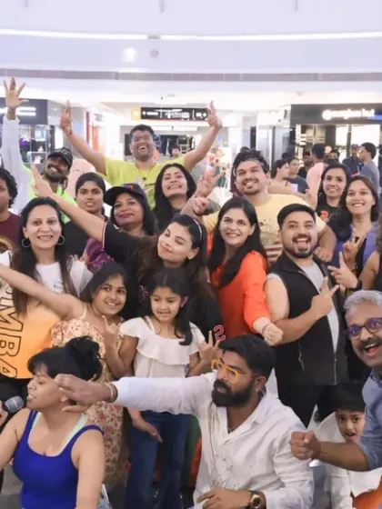 A huge, happy group photo with participants at our charity Zumba event. The sense of community and shared purpose at these events is truly special.