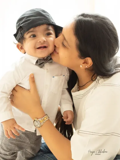 "You are my sunshine." A mother's gentle kiss for her little boy. These are the tender moments I aim to capture during every family and milestone session.