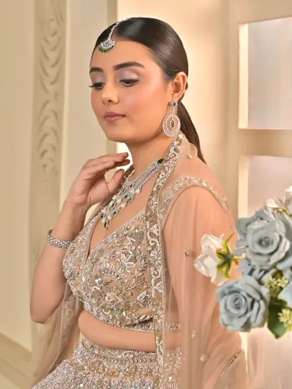 Another angle of this gorgeous sangeet look. The makeup is designed to look stunning from every angle, with a focus on radiant skin and soft, romantic details.