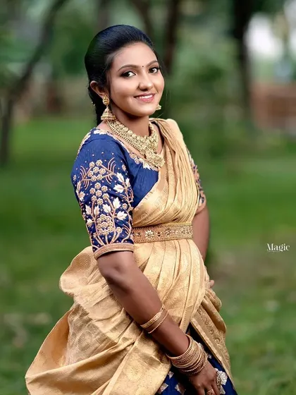 This stylish half-saree with a heavily embroidered blouse is a fantastic rental option for a modern yet traditional look.