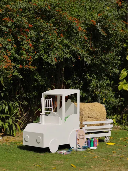 The tractor painting station was a unique and engaging feature, providing both entertainment and a memorable party favor.