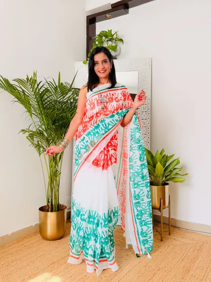 This hand-print tricolor saree is so unique and artistic! It's a playful and creative design that is sure to get you compliments.