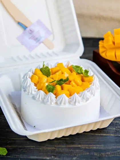 Our Mango Bento Cake is perfect for a personal treat or a sweet gift. It's a mini version of our fresh cream mango cake, packed in a convenient and eco-friendly bento box.