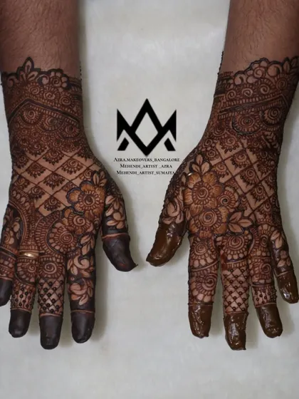 Another beautiful design option for the bride's mother or other close family members, featuring floral and net patterns.