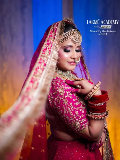 The elegance of a bridal veil shot. This image highlights the soft, diffused light and the bride's glowing skin, demonstrating advanced techniques in bridal styling and photography.
