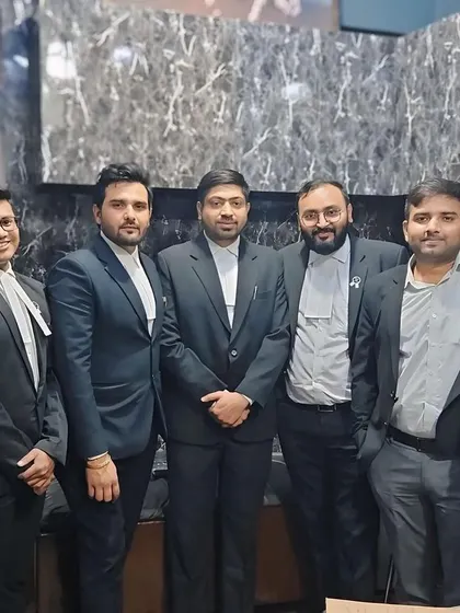 With my team of advocates, who are active in Saket and Karkardooma district courts.