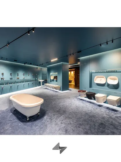 The entire showroom floor is designed as a cohesive experience, where customers can move from broad views to detailed product interactions effortlessly.