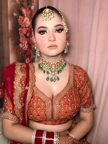 A close-up of the makeup, showing the flawless base and the soft, shimmering eye look.