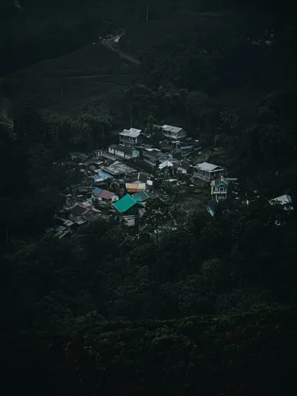 a small village nestled in a dark, green valley. this top-down perspective is similar to how i think about organizing information on a screen.