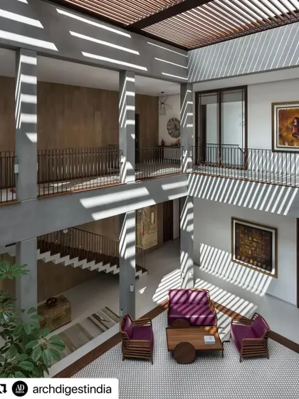 A breathtaking view of the central courtyard of the home featured in Architectural Digest India. You can spot one of my larger paintings on the upper level, contributing to the home's blend of austerity and rich spatial experience.