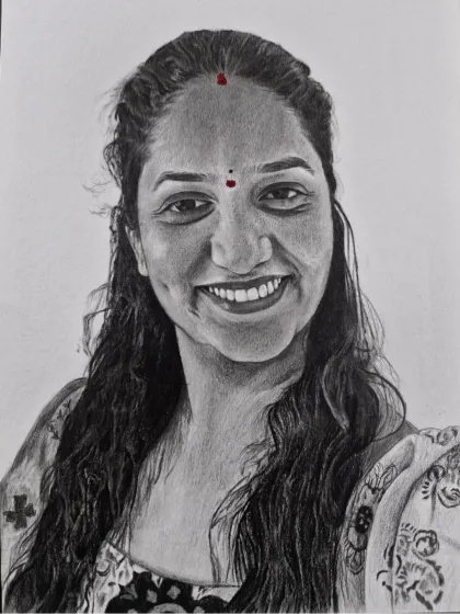A smiling portrait, commissioned as a paid work. The dimple and the pattern on the dupatta are details I love to capture.