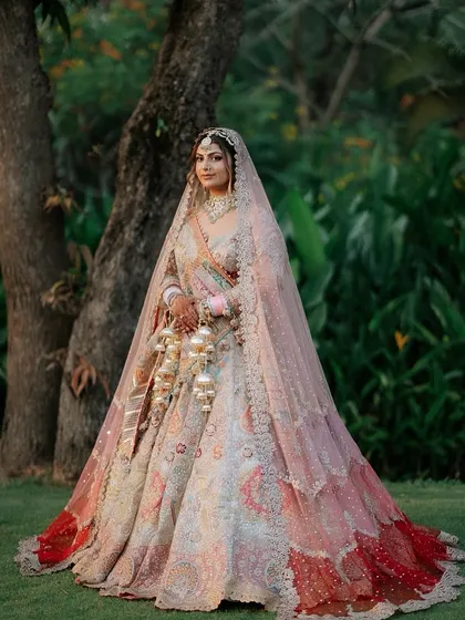 The full, breathtaking view of Khyati's bridal lehenga. She looks like royalty.