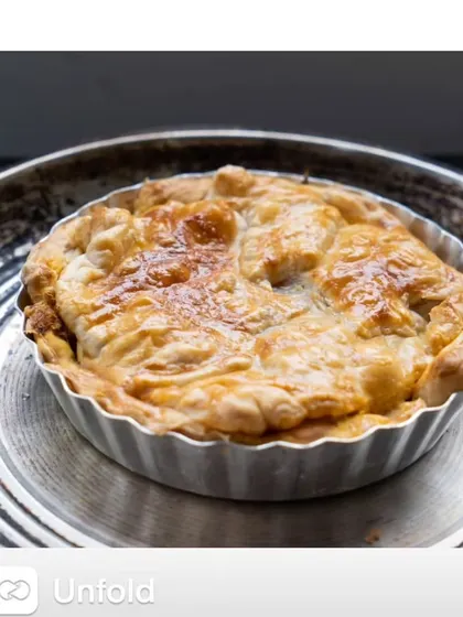The final baked Kolhapuri chicken pie. It has a flaky, buttery crust and a hearty, spicy filling, a perfect example of my culinary experiments.