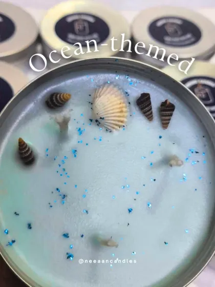 Drift into the calm of the coast with my ocean-themed candle. I top it with real shells and a beachy shimmer to bring relaxing sea vibes right into your home.