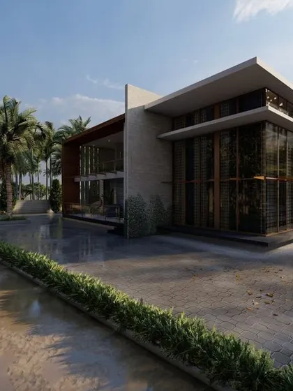 A grand villa design set in a lush, green landscape. The architecture features expansive glass walls and a wide driveway, creating an impression of luxury and openness.