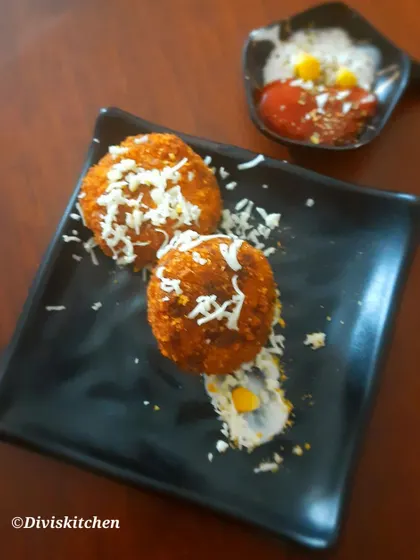 Crispy cheese corn balls served with a side of dip. These were part of a large evening snacks order that also included 50 cutlets and stuffed garlic bread.