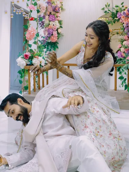 A fun and playful moment between the couple during their Mehendi event. We believe in capturing the friendship and laughter that is the foundation of a strong relationship.