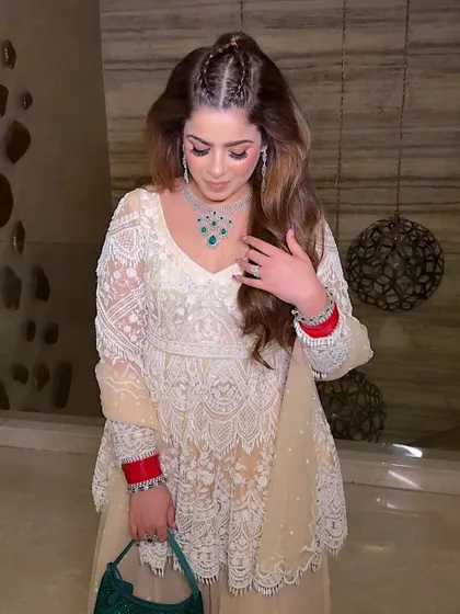 A beautiful, soft glam look for a traditional event. The makeup is clean and fresh, with a focus on glowing skin and softly defined eyes.