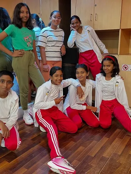 A snapshot from our March dance diary. This photo captures the fun and friendship among our junior students after a great class.