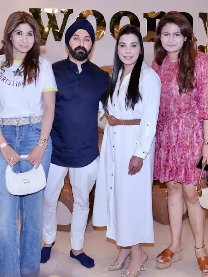 A group of friends posing for a photo in our modern and chic venue.