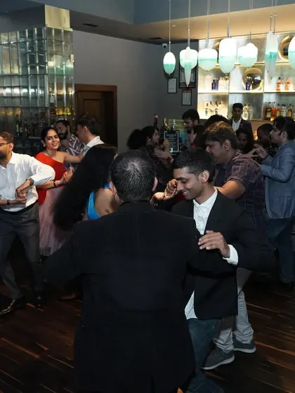 A bustling scene at our Havana Nights social at Wink, Vivanta. You can see the bar in the background and dancers enjoying the vibrant atmosphere. It's the perfect place to unwind on a Friday.