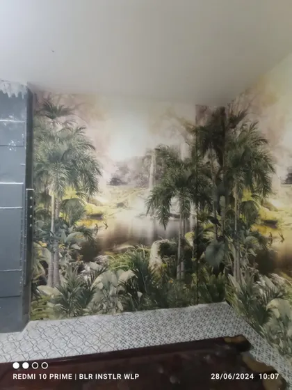 A view of the jungle mural from the bed's perspective.