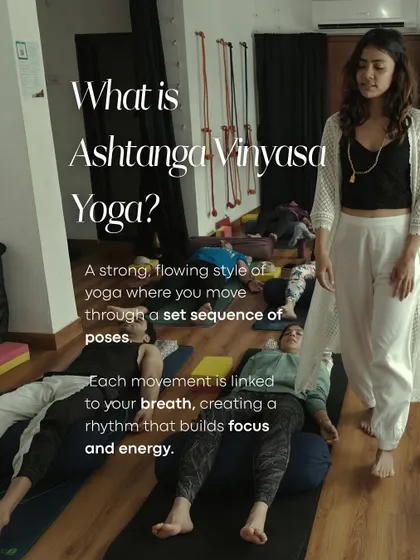 An instructor guides students through Savasana at the end of an Ashtanga Vinyasa class. This image explains the core principles of this strong, flowing style of yoga that links breath to movement.