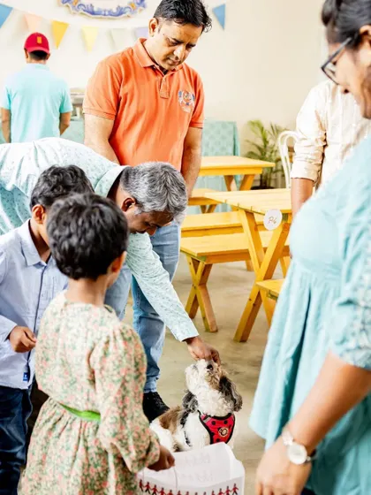 We can't forget the furry family members! Casper the dog was definitely a highlight of this birthday party, getting lots of love and attention from all the guests.
