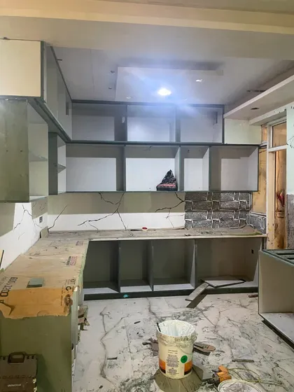 Another view of the kitchen carcass installation. This is the backbone of a sturdy and long-lasting modular kitchen.