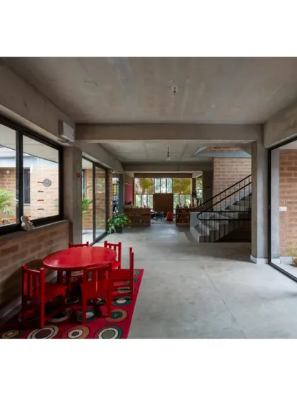 A duplicate of image 24, showing the open corridors at the Mathru Centre.