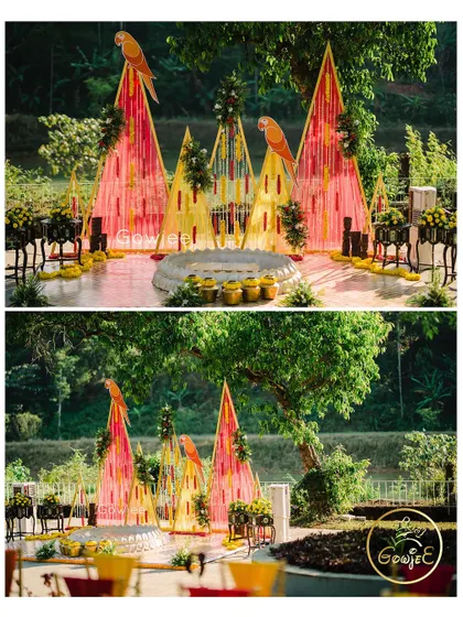 Another view of the unique, parrot-themed Haldi stage, showcasing the vibrant colors and creative design.