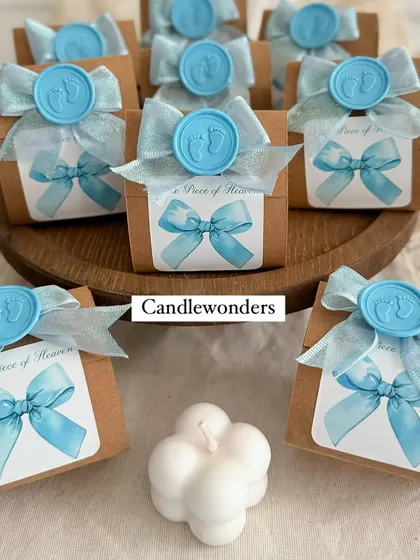 The complete baby shower favor, showing the mini bubble candle next to its adorable packaging.