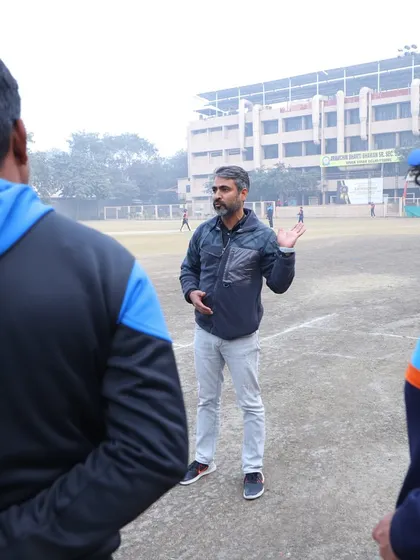 Ajay Ratra interacting with our coaches, sharing his deep understanding of the game and insights on identifying and nurturing young talent.