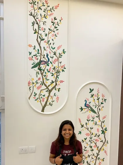 Here I am with the finished peacock and lemon tree mural. This piece was painted within two elegant arched niches, creating a modern take on traditional Indian motifs. It’s always a proud moment to see a client's vision come to life on their wall.