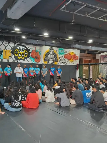 Our coaches addressing the students during the workshop. We believe in sharing the power of martial arts with the wider community.