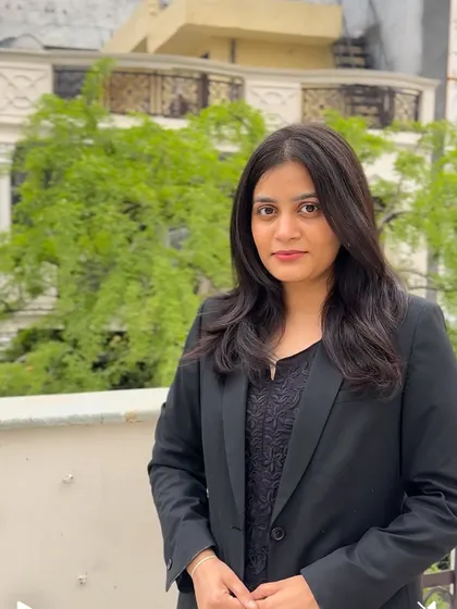 My expression is one of focus and readiness. When dealing with online fraud and digital wrongdoing, I am always prepared to counter falsehoods with facts and legal expertise.