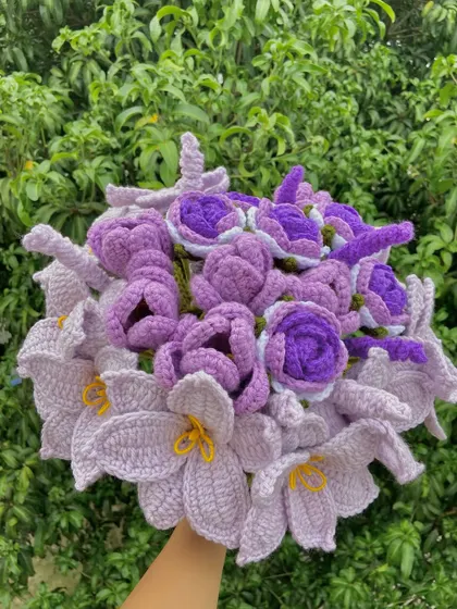 A custom all-purple bouquet featuring a mix of lilies, tulips, and roses.