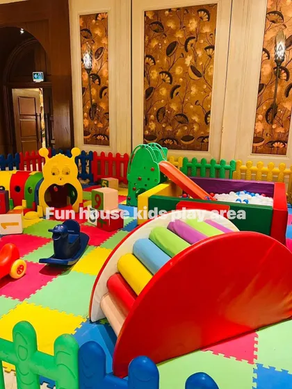 A close-up of the rainbow setup, showing the colorful bridge climber and picket fence.