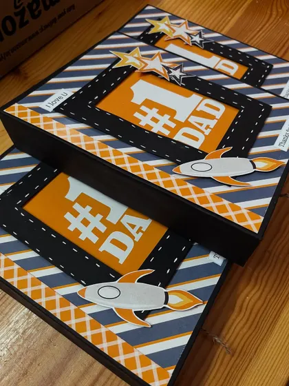 A still shot of our "#1 Dad" themed explosion boxes, perfect for celebrating the superhero in your life on Father's Day.