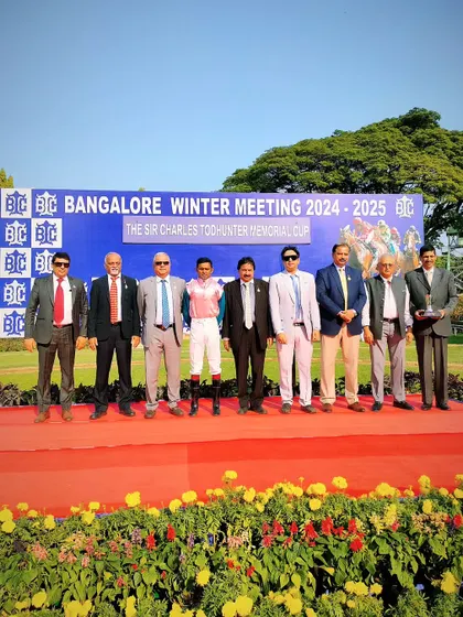 The winning team of Invincible at the presentation ceremony for The Sir Charles Todhunter Memorial Cup.